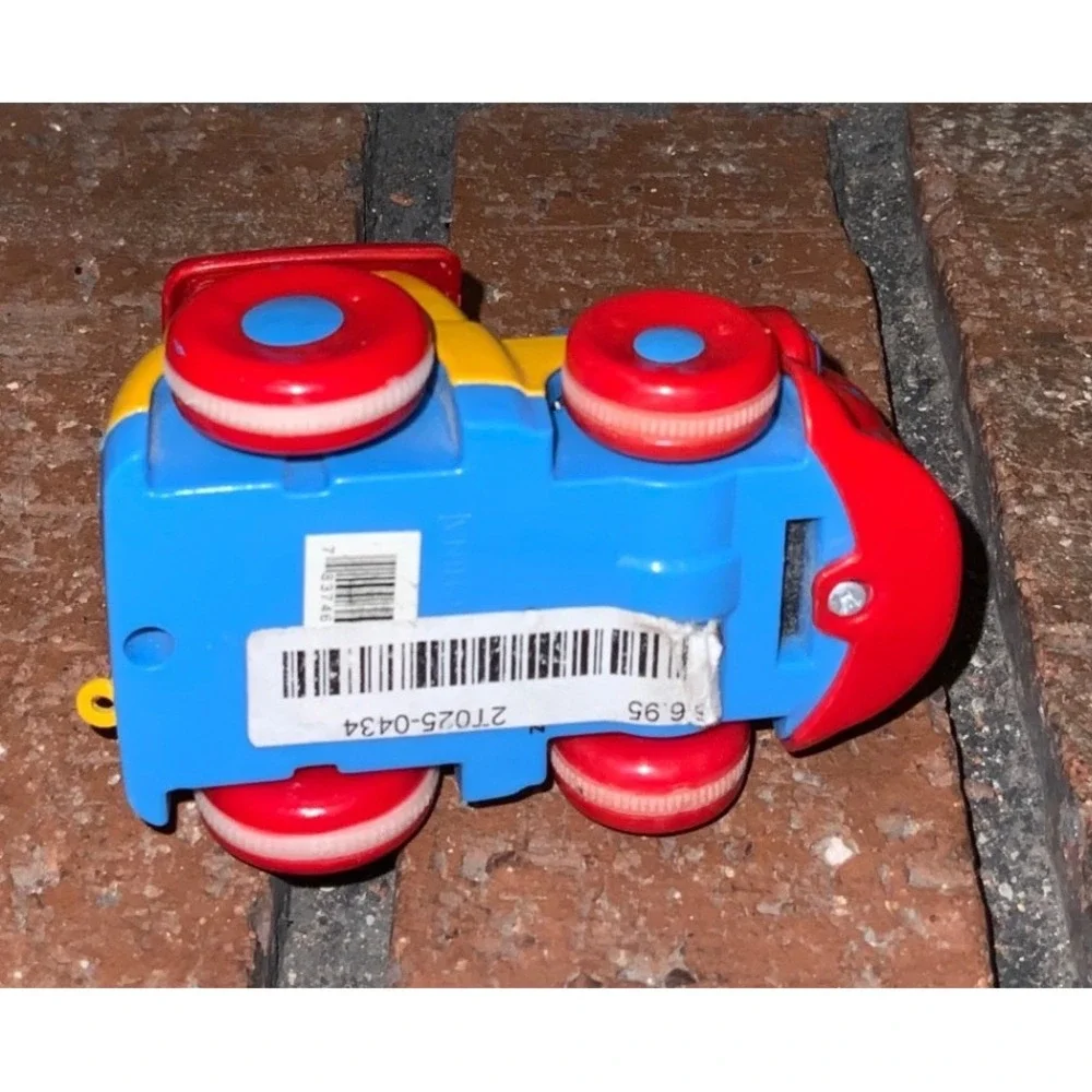 Red Yellow Blue Plastic Toy Train Engine with Cartoon Face Rolling Wheels 3
